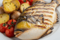 🐟 Pesce Balestra in cucina: come cucinarlo alla griglia con patate e pomodorini